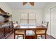 Charming dining room featuring a wooden table and chairs, perfect for Gathering meals at 521 Bent Oak Ct, Spring Hill, FL 34609