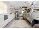 Spacious garage with ample storage, room for a truck, and potential for a workshop area at 521 Bent Oak Ct, Spring Hill, FL 34609