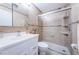 Clean bathroom features a white vanity, shower with glass enclosure, and a tile floor at 5785 15Th N Ave, St Petersburg, FL 33710