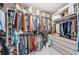 Walk-in closet with custom shelving, drawers, and ample space for organization at 5785 15Th N Ave, St Petersburg, FL 33710