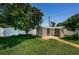 Well-maintained storage shed in a spacious backyard, offering ample storage space at 5785 15Th N Ave, St Petersburg, FL 33710