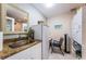 Functional utility room with sink, refrigerator, and ample counter space for tasks at 5785 15Th N Ave, St Petersburg, FL 33710