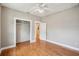Bedroom features an open closet and an attached bathroom at 6006 N Highland Ave, Tampa, FL 33604