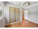 Bedroom with a window, closet and view to other rooms at 6006 N Highland Ave, Tampa, FL 33604