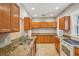 Spacious kitchen with granite countertops and lots of cabinet space at 6006 N Highland Ave, Tampa, FL 33604