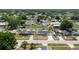 Great neighborhood view of a cozy home and neighboring houses in a peaceful setting at 6110 16Th St, Zephyrhills, FL 33542