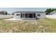 Property features a screened-in porch and patio in the expansive backyard, perfect for relaxing at 6110 16Th St, Zephyrhills, FL 33542