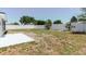 Spacious backyard features a concrete patio, with a fence to ensure privacy at 6110 16Th St, Zephyrhills, FL 33542