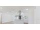 Bright kitchen with quartz countertops, modern appliances, and a breakfast bar at 6110 16Th St, Zephyrhills, FL 33542