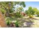 Spacious backyard featuring lush landscaping, mature trees, and serene outdoor setting at 7401 11Th N Ave, St Petersburg, FL 33710