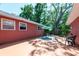 Backyard featuring a patio with outdoor seating, perfect for enjoying the outdoors, with privacy fence at 7401 11Th N Ave, St Petersburg, FL 33710