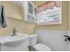 Bathroom with vanity, sink, and toilet at 7401 11Th N Ave, St Petersburg, FL 33710