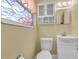 Bathroom with stained glass window and updated vanity at 7401 11Th N Ave, St Petersburg, FL 33710