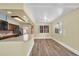 Bright kitchen with wood cabinets and bar area at 7401 11Th N Ave, St Petersburg, FL 33710