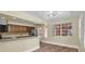 Bright kitchen with wood cabinets and bar area at 7401 11Th N Ave, St Petersburg, FL 33710