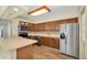 Well-equipped kitchen featuring stainless steel appliances, ample cabinet space, and a functional layout at 7401 11Th N Ave, St Petersburg, FL 33710