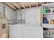 Functional laundry room with washer, dryer, and storage space at 7401 11Th N Ave, St Petersburg, FL 33710