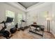 Bright exercise room with hardwood floors and space for workout equipment and a desk at 790 36Th N Ave, St Petersburg, FL 33704