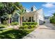 A charming home showcasing professional landscaping and inviting curb appeal at 790 36Th N Ave, St Petersburg, FL 33704