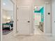 Hallway with views of bedroom and bathroom, creating an open and connected living space at 790 36Th N Ave, St Petersburg, FL 33704