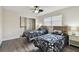 Bright bedroom with two beds, a large window, and a spacious closet at 854 Village Way, Palm Harbor, FL 34683