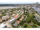 Beautiful neighborhood aerial view of a lush city with waterfront views, green landscaping, and neighborhood highlights at 904 Villa Venicia Way, Tampa, FL 33606