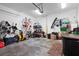 Well lit garage with lots of open space provides ample storage solutions with organizational shelving and hanging racks at 904 Villa Venicia Way, Tampa, FL 33606