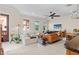 Cozy living room featuring hardwood floors, neutral paint and views into the kitchen at 904 Villa Venicia Way, Tampa, FL 33606