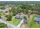 Inviting home with a spacious front yard and screened-in pool, set amidst a lush, green, wooded neighborhood at 9091 Mazette Rd, Weeki Wachee, FL 34613