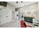 Bright bedroom with hardwood floors, spacious closets, and ensuite bathroom entrance at 9091 Mazette Rd, Weeki Wachee, FL 34613