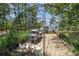 Charming chicken coop with chickens, adding a touch of rustic charm to the property at 9091 Mazette Rd, Weeki Wachee, FL 34613