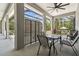 Enclosed patio with dining table and barbecue at 9091 Mazette Rd, Weeki Wachee, FL 34613