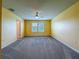 Bright bedroom featuring ample light from the windows at 9324 Rally Spring Loop, Wesley Chapel, FL 33545