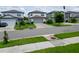 Charming two-story home with a well-manicured lawn and a two car garage at 9324 Rally Spring Loop, Wesley Chapel, FL 33545