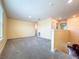 Carpeted loft area with lots of space at 9324 Rally Spring Loop, Wesley Chapel, FL 33545