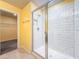 Bathroom featuring tiled shower at 9324 Rally Spring Loop, Wesley Chapel, FL 33545