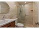 Modern bathroom featuring a glass enclosed shower, vessel sink, and elegant tile work at 1250 S Pinellas Ave # 214, Tarpon Springs, FL 34689