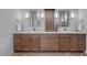 Bathroom featuring double vanity with marble countertop and modern fixtures at 12705 Green Heron Way, Odessa, FL 33556