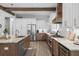 Well-equipped kitchen with stainless steel appliances, granite countertops, and plenty of cabinet space at 12705 Green Heron Way, Odessa, FL 33556