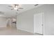 Inviting living room featuring tile flooring, ceiling fan, and an open concept design at 13423 Crest Lake Dr, Hudson, FL 34669