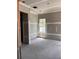 Empty bedroom with unfinished drywall and a bright window, a blank canvas for your dream bedroom design at 1435 17Th N Ave, St Petersburg, FL 33704