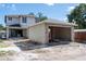 Construction of a two-story home with a detached garage, showcasing its early stage development and design at 1435 17Th N Ave, St Petersburg, FL 33704