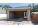 An unfinished detached garage features block construction and wood framing at 1435 17Th N Ave, St Petersburg, FL 33704