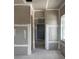 Hallway under construction, displaying a view to rooms, showcasing a connected floor plan at 1435 17Th N Ave, St Petersburg, FL 33704
