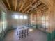 Interior framing and masonry are visible in this under-construction space, showing the structural elements and window placement at 1435 17Th N Ave, St Petersburg, FL 33704