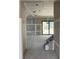 Unfinished living room featuring drywall, recessed lighting, and a sliding glass door at 1435 17Th N Ave, St Petersburg, FL 33704
