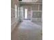 Bright room with unfinished drywall and window door leading to the outside ready for your personalization at 1435 17Th N Ave, St Petersburg, FL 33704