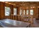 A partially finished room features wood framing and multiple windows at 1435 17Th N Ave, St Petersburg, FL 33704