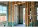 Unfinished room with a block wall, wood framing, and a window at 1435 17Th N Ave, St Petersburg, FL 33704