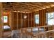 Unfinished room featuring a wood frame, windows, and construction materials at 1435 17Th N Ave, St Petersburg, FL 33704